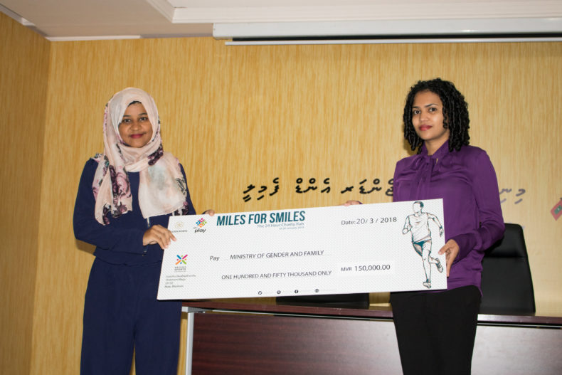 Handing over the donation cheque to Ministry of Gender and Family